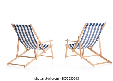 Rear View Of Two Beach Chairs, Isolated On White