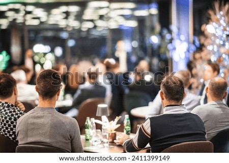 Rear view of unrecognizable people at banquet business meeting event. Business and entrepreneurship events concept.
