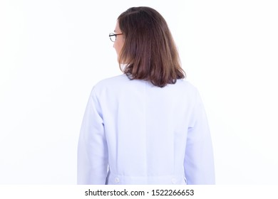 Rear View Of Woman Doctor With Eyeglasses Looking Over Shoulder