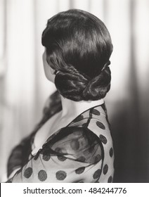 Rear view of woman's 1940s hairstyle