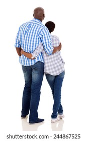 Rear View Of Young African American Couple Hugging On White Background