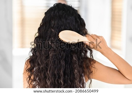 Similar – Image, Stock Photo Unrecognizable curly haired woman admiring mountains