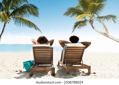 Rear View Of A Young Couple Relaxing On Deck Chair At Beach - Powered by Shutterstock