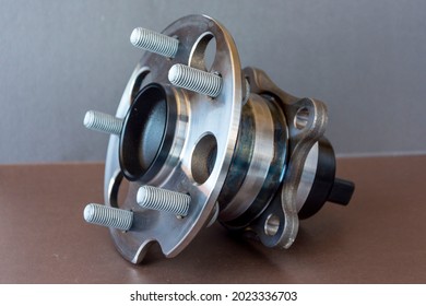 Rear Wheel Hub Assembly With ABS Sensor On A Colored Background, Auto Parts, Bearing.