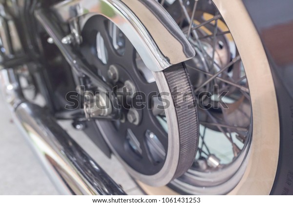 rear\
wheel of motorcycle with belt transmission\
rotation