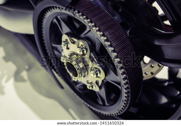 Rear\
wheel of motorcycle with belt transmission\
rotation