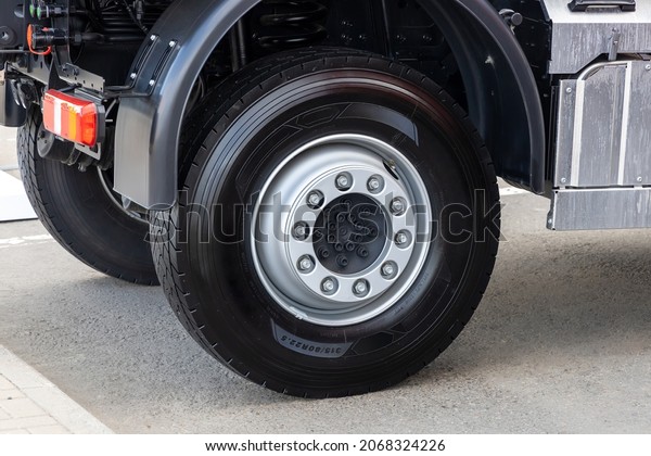 Rear wheels of a truck with new tires, close-up.\
New tubeless tires on a\
truck