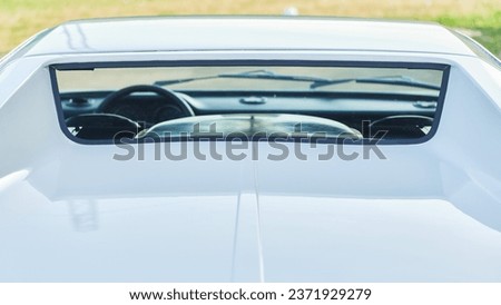 Rear window on a white car