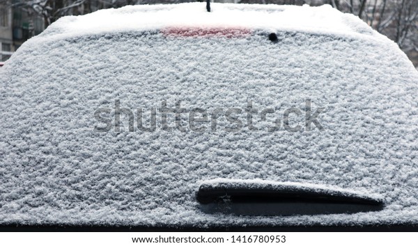                            \
Сar rear window in the snow\
   