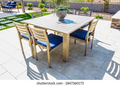 Rear Yard Patio Furniture With Table, Chairs And Couch - Powered by Shutterstock