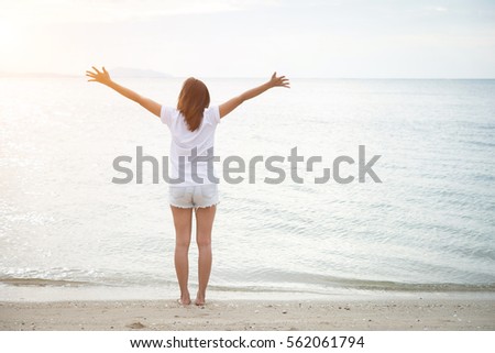 Similar – Image, Stock Photo feet of a person lying on a towel on the beach, top view