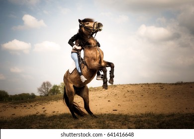 rearing-horse-rider-260nw-641416648.jpg