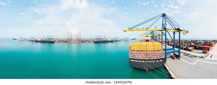 Rearview cargo container ship. Business logistic transportation sea freight, Cargo ship, Cargo container in deep seaport for the international order concept. Island for shipping containers port