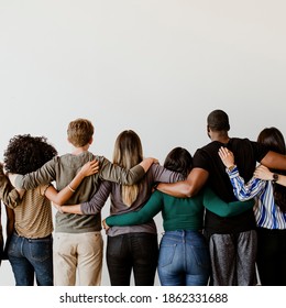 Rearview of diverse people hugging each other - Shutterstock ID 1862331688