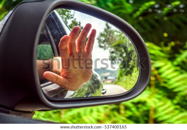 rearview mirror hand out car\
window