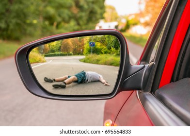 Rearview Mirror With A Man Hit By A Car - Car Accident Concept