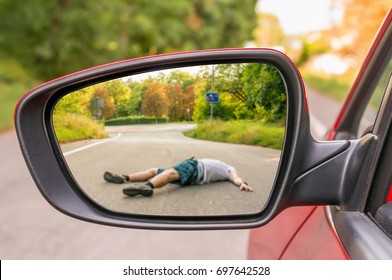 Rearview Mirror With A Man Hit By A Car - Car Accident Concept