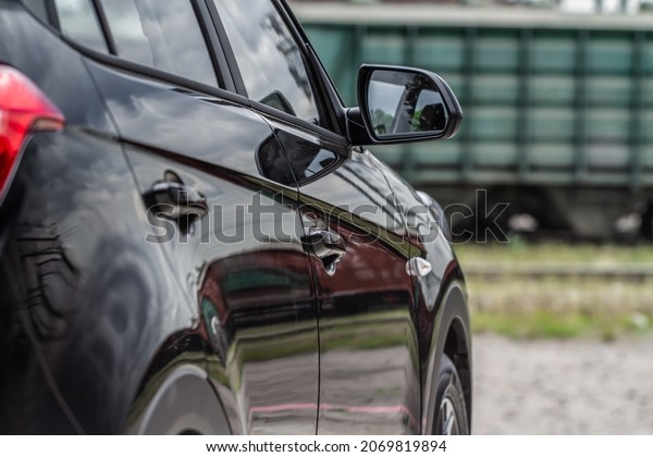 Rearview mirror of a modern car. Close up of\
modern car mirror.