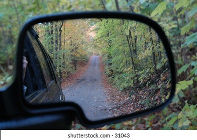 Rearview Mirror Shot Out The Truck Window.