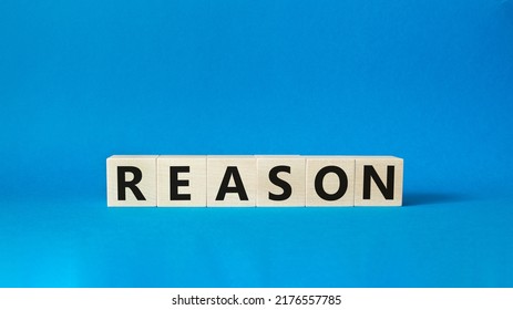 Reason symbol. Concept word Reason on wooden cubes. Beautiful blue background. Business and Reason concept. Copy space. - Shutterstock ID 2176557785