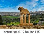 The re-assembled remains of the Temples of Castor and Pollux in the valley of the Temples at Agrigento on Sicily, Italy