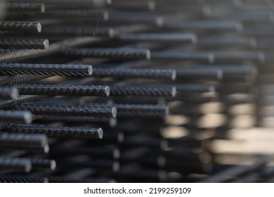 The rebar is bonded with steel wire for use as a construction infrastructure. Which part of the rebar has rusted due to chemical reactions. - Shutterstock ID 2199259109