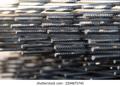 The rebar is bonded with steel wire for use as a construction infrastructure. Which part of the rebar has rusted due to chemical reactions. - Shutterstock ID 2204875745