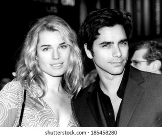 Rebecca Romijn-Stamos, John Stamos As The Premiere Of ANNIE, 11/1/99