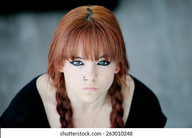 Rebellious Teenager Girl With Red Hair Very Angry View From Above
