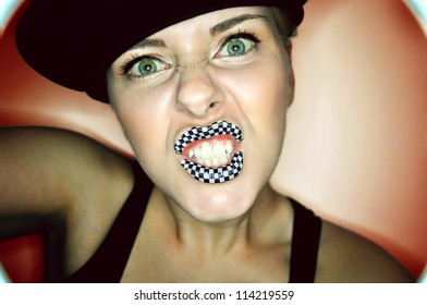 Rebellious Young Woman With Trendy Black And White Checked Lips