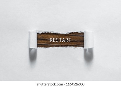 Reboot - An Inscription In The Torn White Paper. The Concept Of Rebooting, Restart.