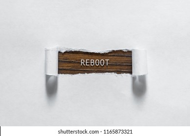 Reboot - An Inscription In The Torn White Paper. The Concept Of Rebooting, Restart.