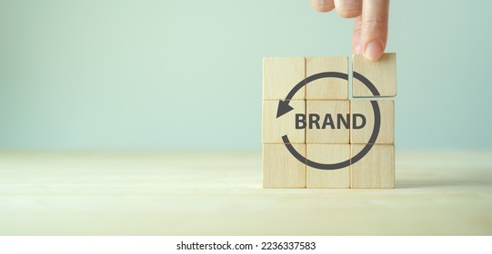 Rebranding strategy concept. Marketing and brand management. Rethinks marketing strategy with a new name, logo, or design, the intention of developing a new. Refreshing the look and feel of brand. - Shutterstock ID 2236337583