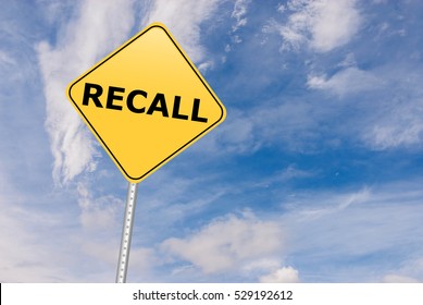 Recall Road Sign Against Sky