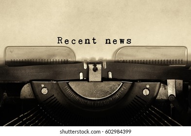 Recent news words typed on vintage typewriter. - Shutterstock ID 602984399