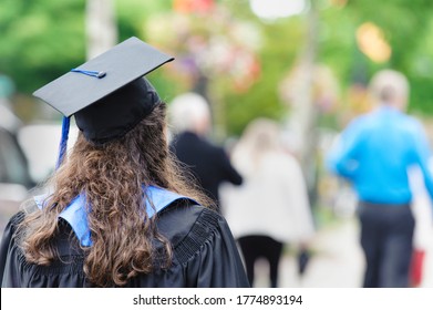 Recent school graduate heads out of school to look for employment - Shutterstock ID 1774893194