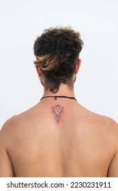 recent tattoo finished with the red skin irritation, minimalist design with dots triangles and circles - Shutterstock ID 2230231911