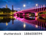 The recently upgraded Swan Bridge reflecting in the Yarra River on a rainy summer evening.