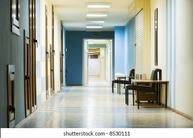 Reception In Hospital With Corridor At Night.