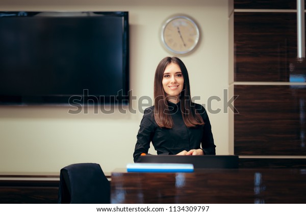 Receptionist Woman Front Her Desk Greeting Stock Photo Edit Now