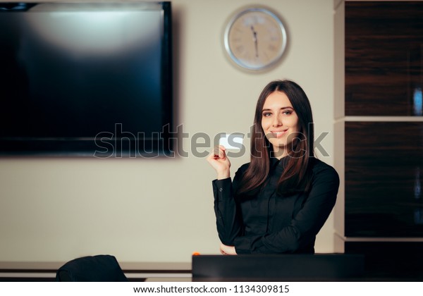 Receptionist Woman Front Her Desk Holding Stock Photo Edit Now