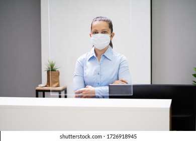 Receptionist Woman At Office Reception Wearing Face Mask