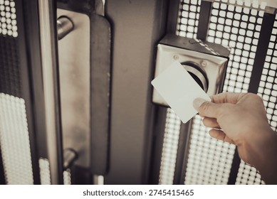 Recessed pool gate sensor captures exact positioning of hotel card during the scan. Perforated metal shadows and warm highlights shape a clean, modern commercial texture, Long Beach, CA. USA