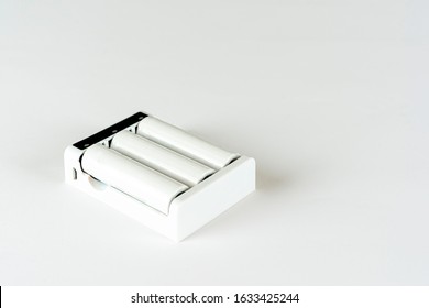 Rechargeable Battery. Quick AA Charger On White Background