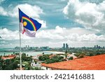 Recife, Pernambuco, Brazil. November, 19, 2016. The flag of Pernambuco waving at Alto da Sé. On the background, the cities of Olinda and Recife.