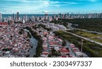 Recife Pernambuco Nordeste Shopping RioMar Buildings Favelas Slums Houses Shantytown Town Pina Cabanga Afogados River Sea Flood Inequality Bridge Transport Cars