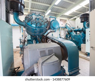 reciprocating air compressor in production plant , multistage piston air compressor  for high pressure - Shutterstock ID 1438877609