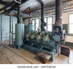 Reciprocating compressor with electronically controlled service intervals. Industrial refrigeration equipment. Food industry. - Shutterstock ID 1647518110