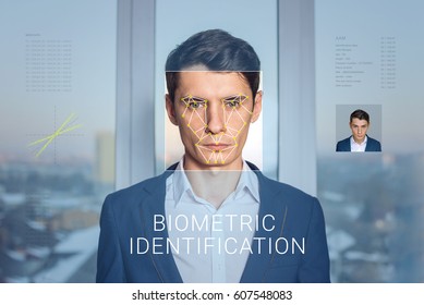 Recognition of a male face by layering a mesh and the calculation of the personal data by the software. Biometric verification and identification - Powered by Shutterstock - Get 15% off with code: PIKWIZARD15