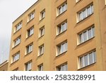 Reconstructed facade on orange block of flats in Havirov, Czechia